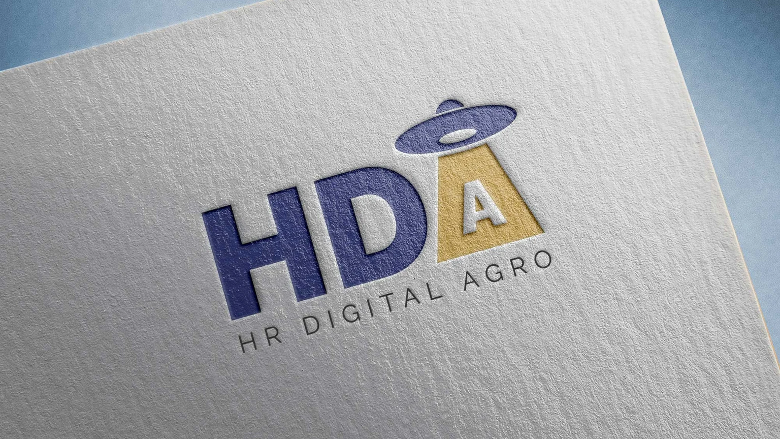 Знак HDA и подпись HR Digital Agro на фактурной бумаге